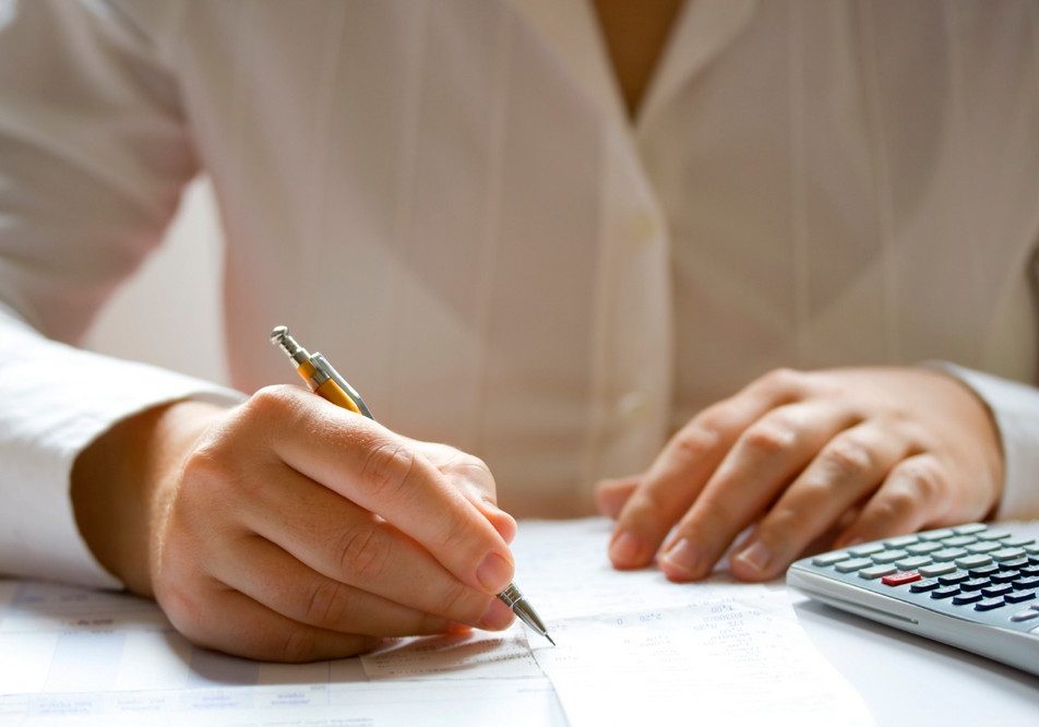 Businesswoman calculating data